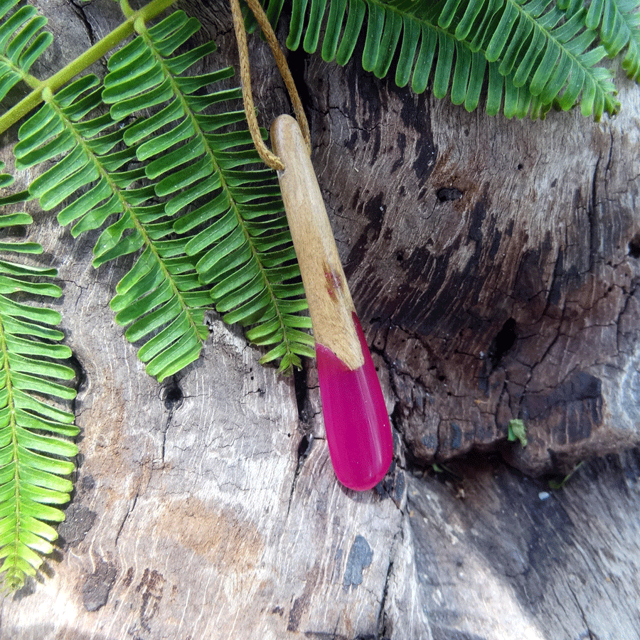 Driftwood with bright pink resin