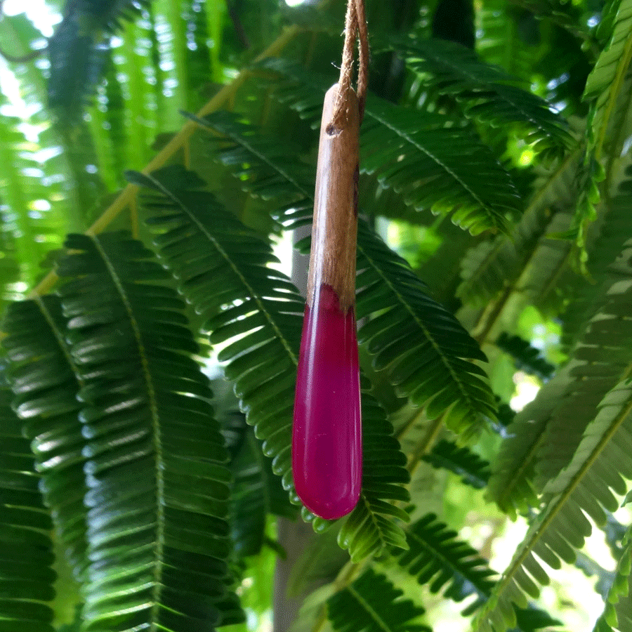 Driftwood with bright pink resin