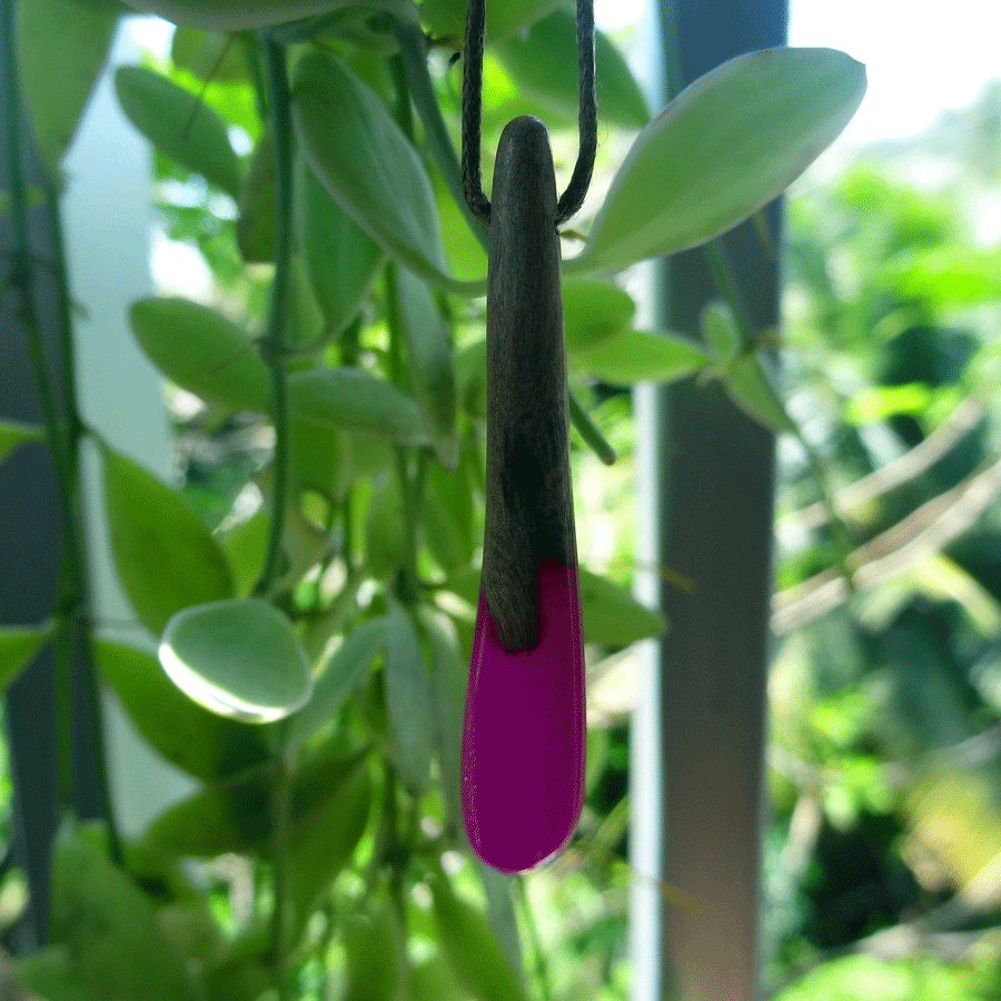 Driftwood with bright pink resin