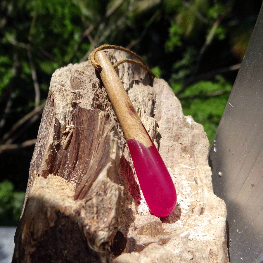 Driftwood with bright pink resin