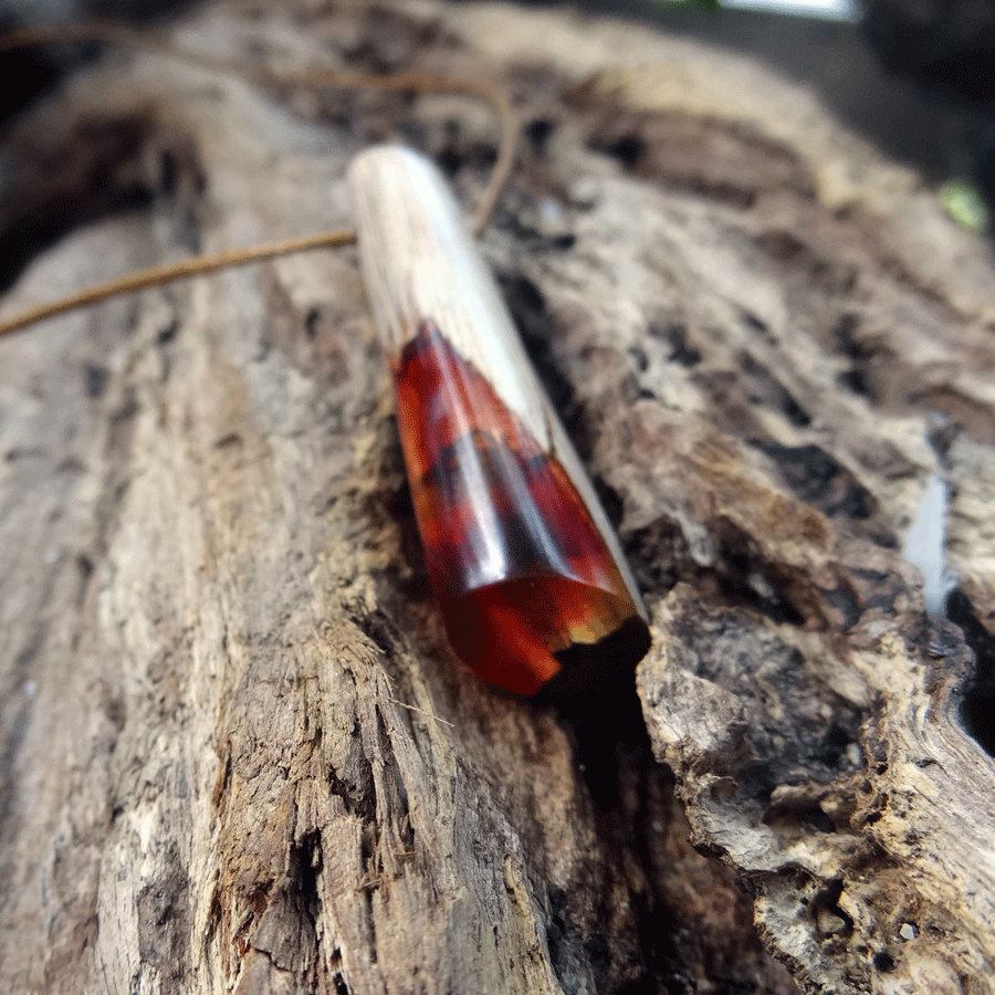 Driftwood with red and yellow resin