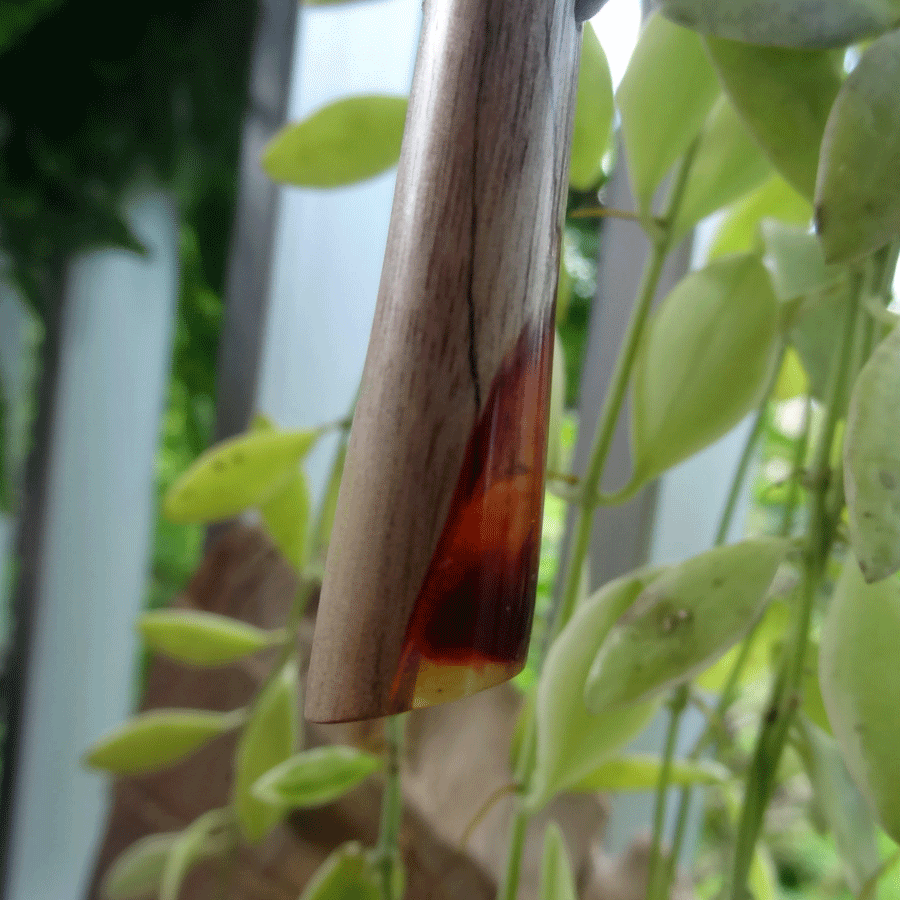 Driftwood with red and yellow resin