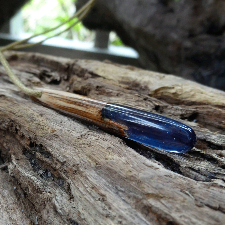 Driftwood with blue and pink resin