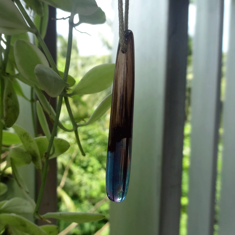 Driftwood with blue and pink resin