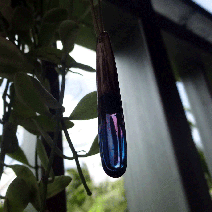 Driftwood with blue and pink resin