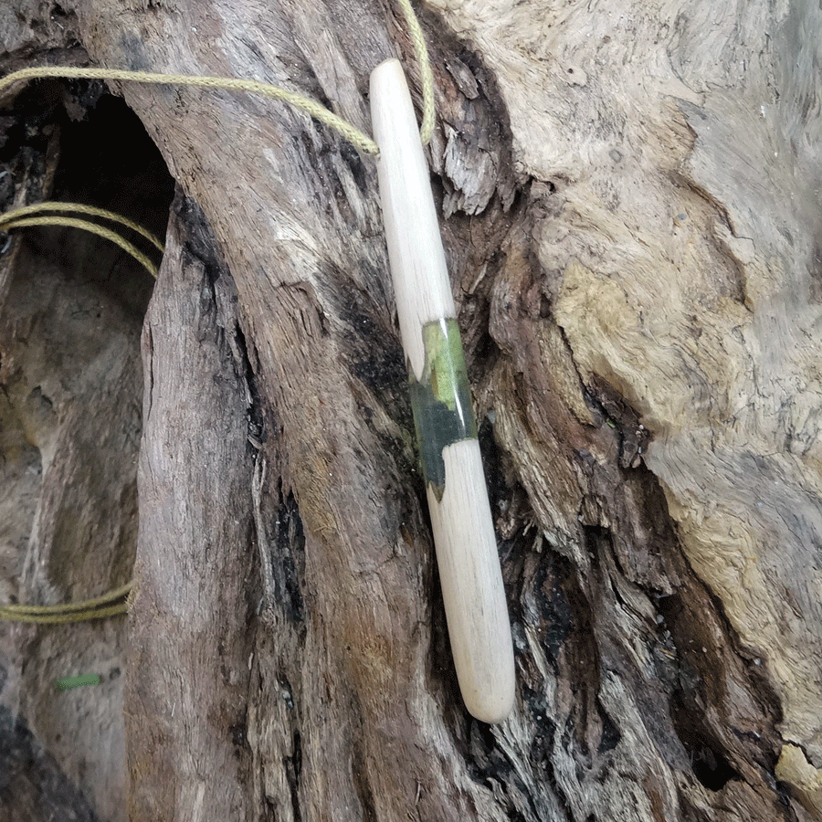 Driftwood with transparent green resin