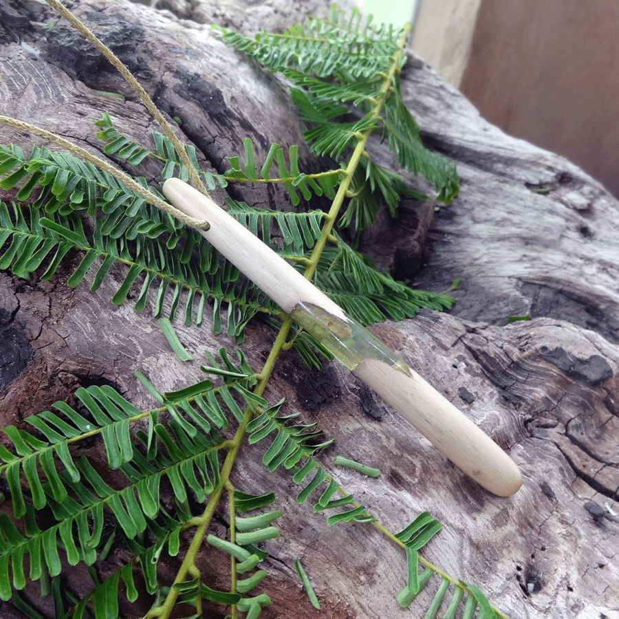 Driftwood with transparent green resin