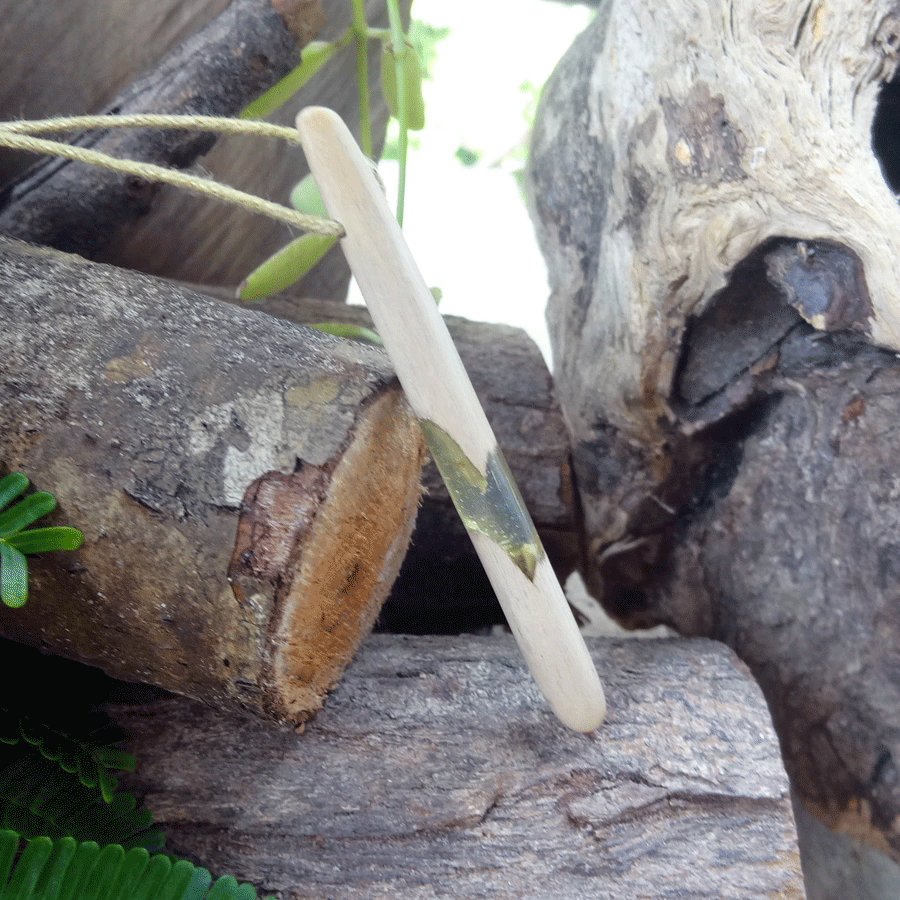 Driftwood with transparent green resin