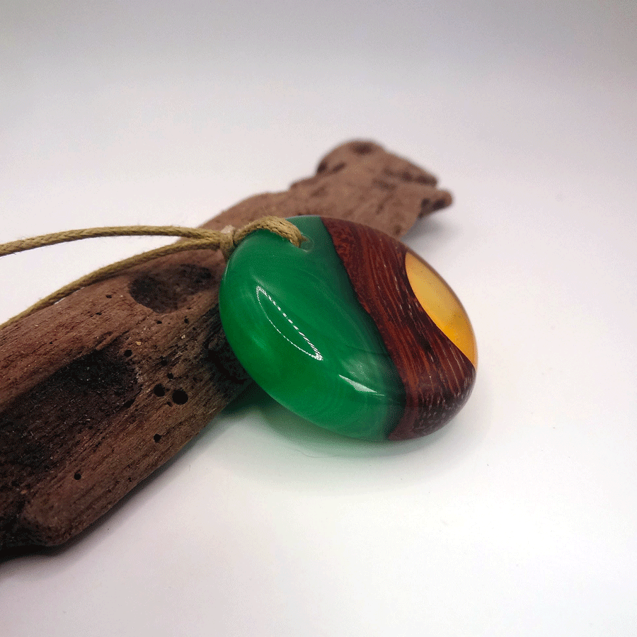 Driftwood with green and orange resin