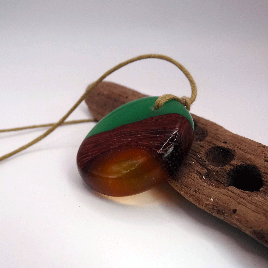 Driftwood with green and orange resin