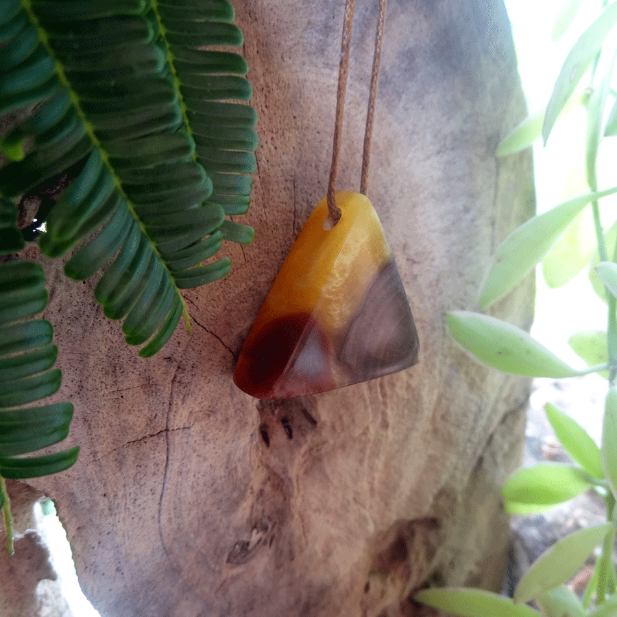 Driftwood with yellow and red resin