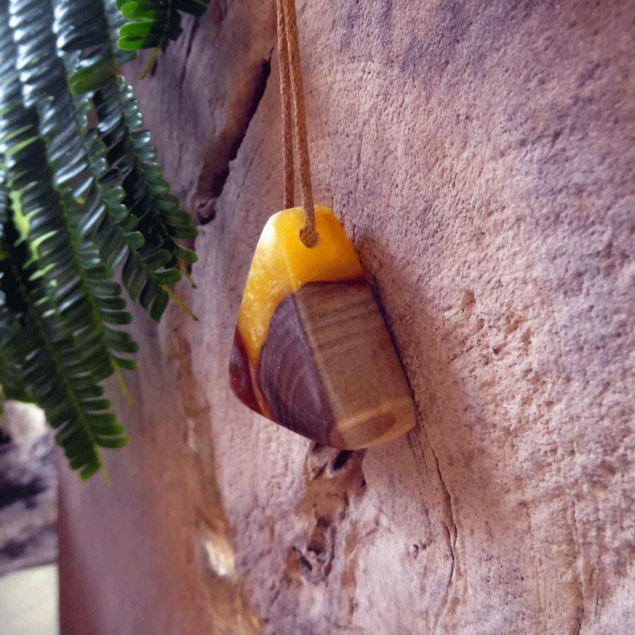 Driftwood with yellow and red resin