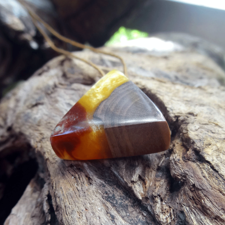 Driftwood with yellow and red resin