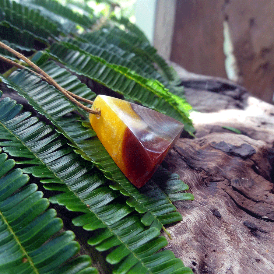 Driftwood with yellow and red resin