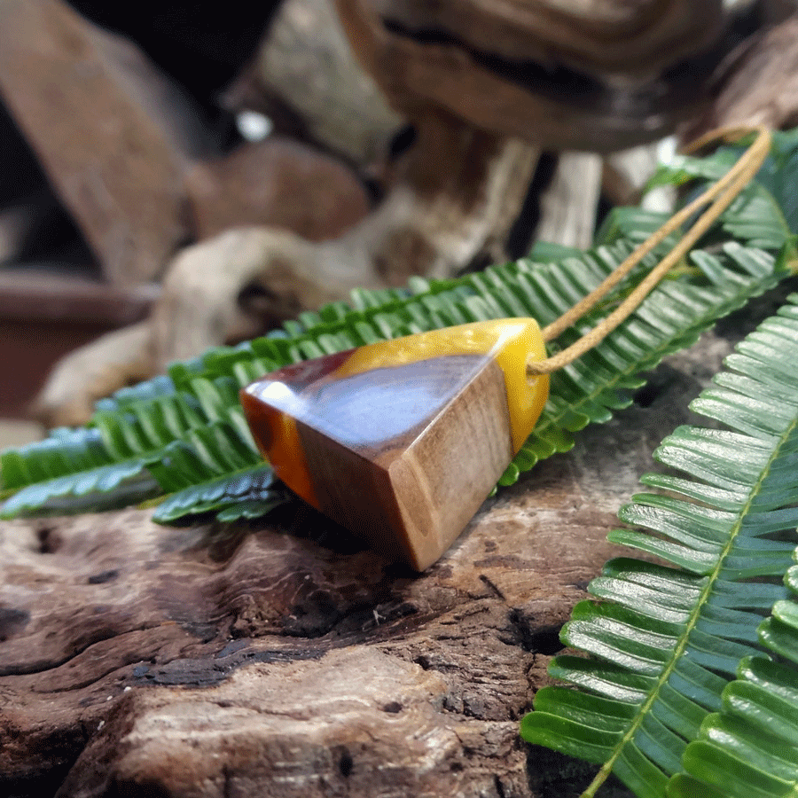 Driftwood with yellow and red resin