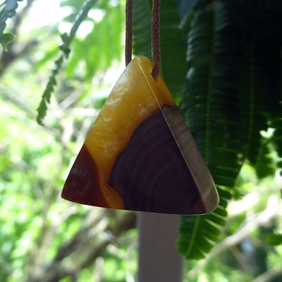 Driftwood with yellow and red resin