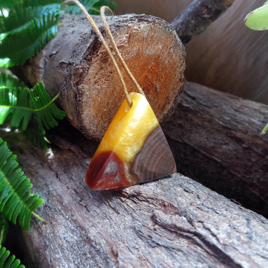 Driftwood with yellow and red resin