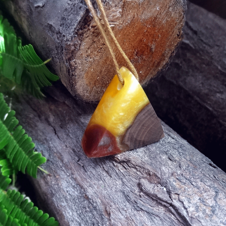 Driftwood with yellow and red resin