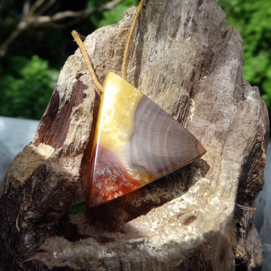 Driftwood with yellow and red resin