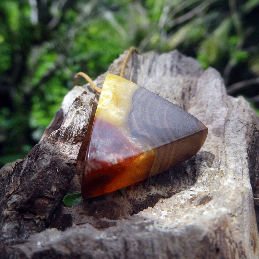 Driftwood with yellow and red resin