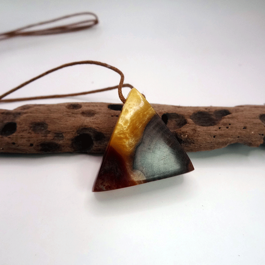 Driftwood with yellow and red resin