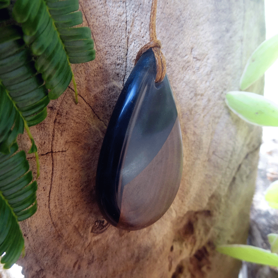 Driftwood with dark green resin