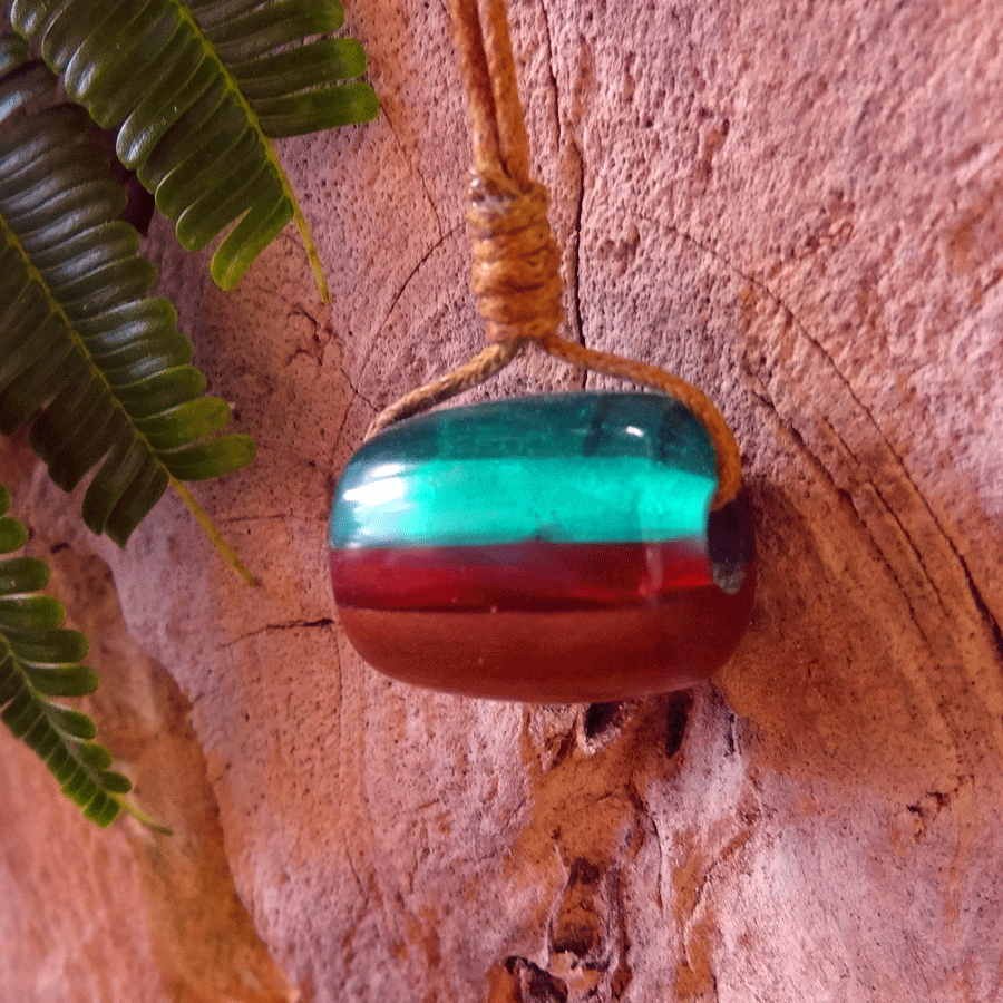 Driftwood with green and red resin