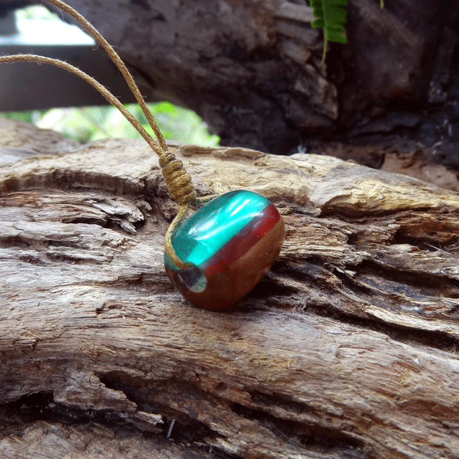 Driftwood with green and red resin