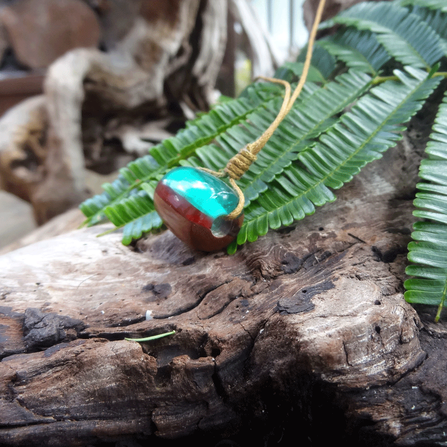 Driftwood with green and red resin