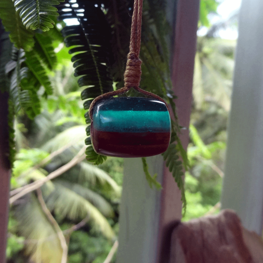 Driftwood with green and red resin