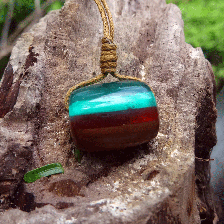 Driftwood with green and red resin