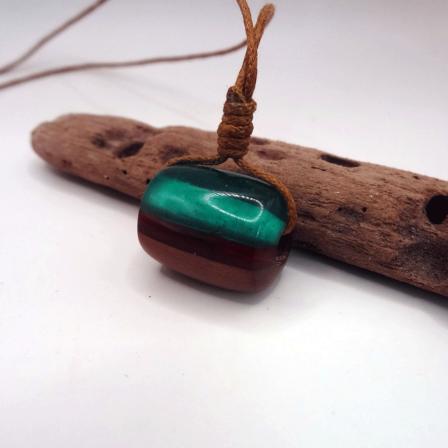 Driftwood with green and red resin