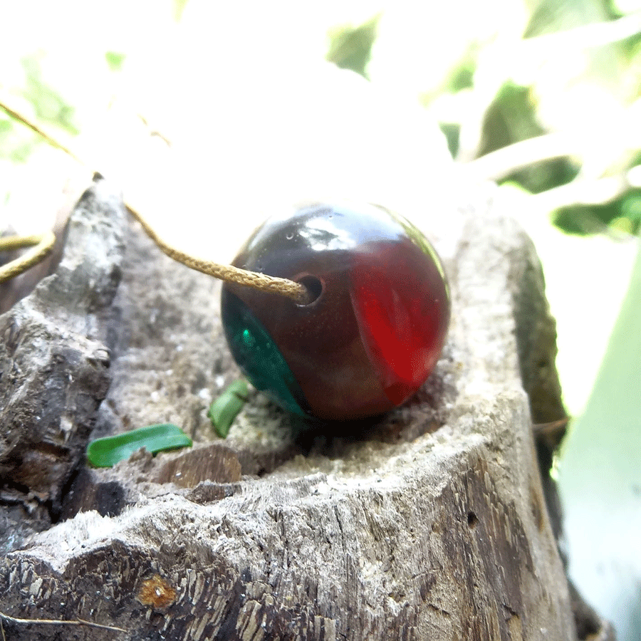 Driftwood with red and green resin