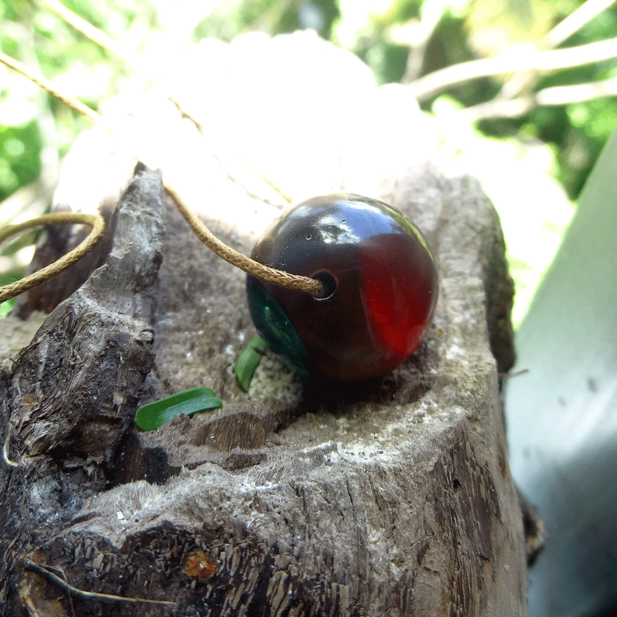 Driftwood with red and green resin