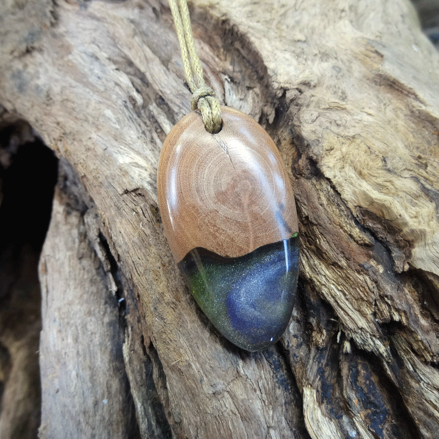 Driftwood with green and purple resin