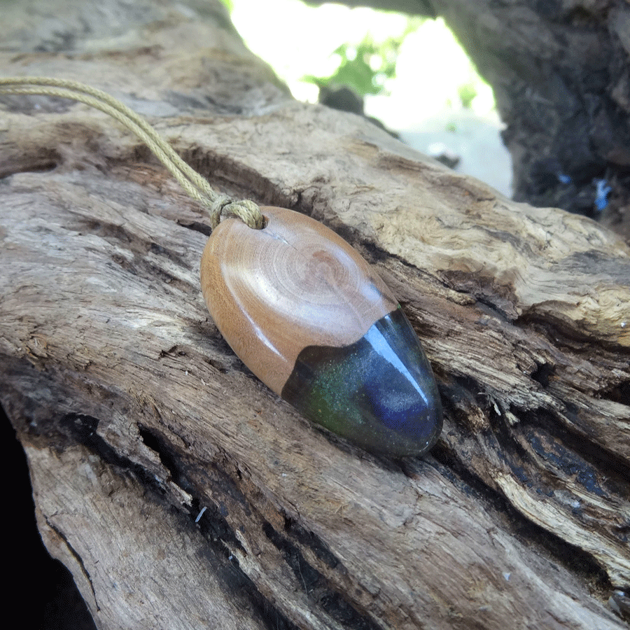 Driftwood with green and purple resin