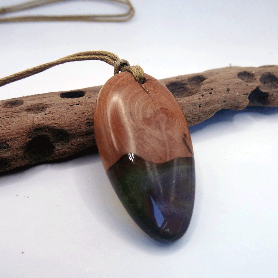 Driftwood with green and purple resin