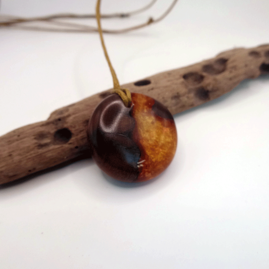 Driftwood with gold and orange resin