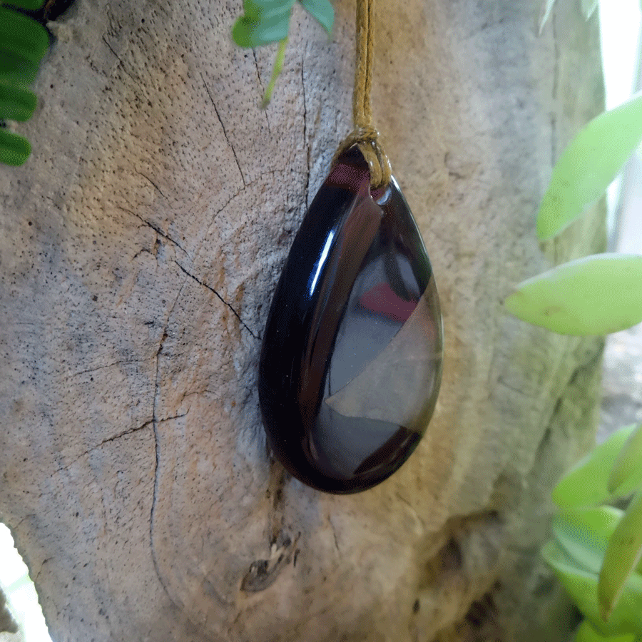 Driftwood with dark red resin