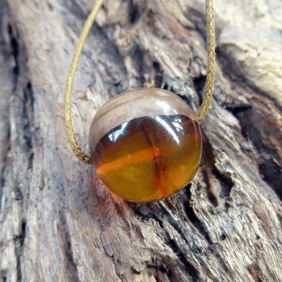 Driftwood with yellow red resin