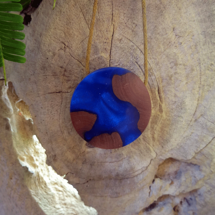 Driftwood with dark blue resin