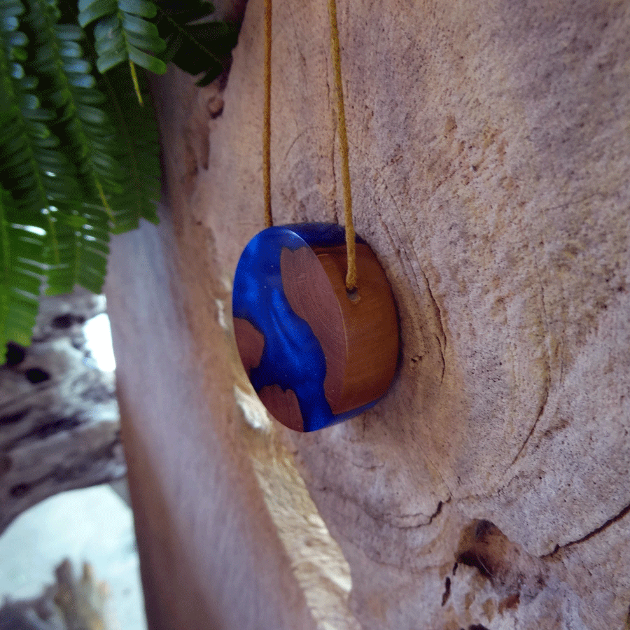 Driftwood with dark blue resin