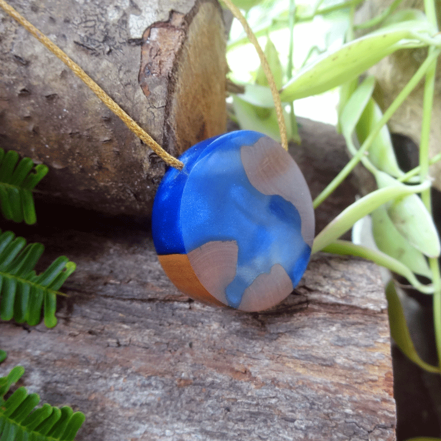 Driftwood with dark blue resin