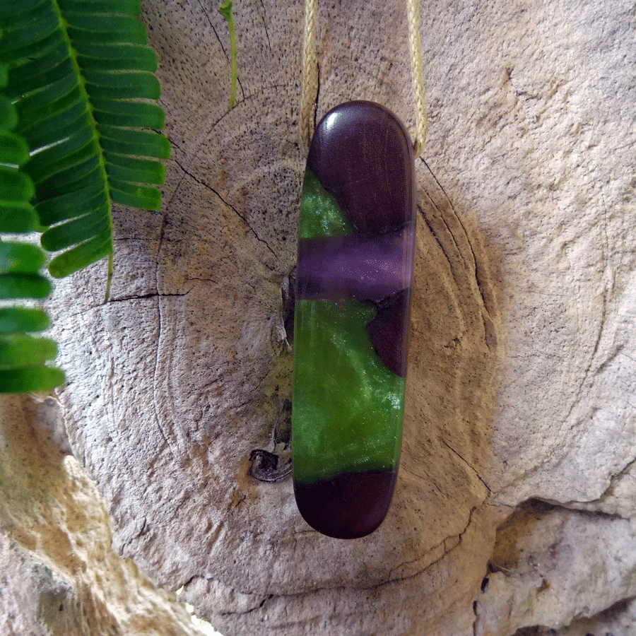 Driftwood with green and purple resin