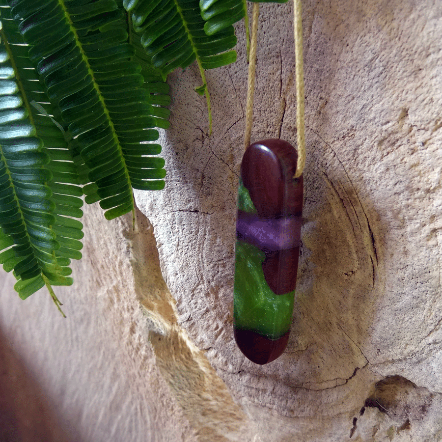 Driftwood with green and purple resin