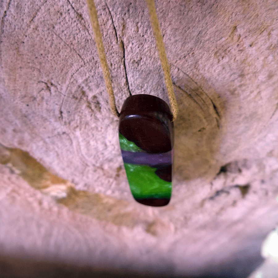 Driftwood with green and purple resin