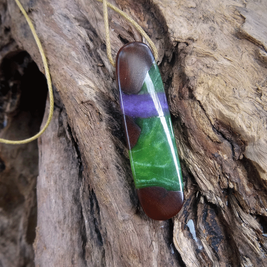 Driftwood with green and purple resin