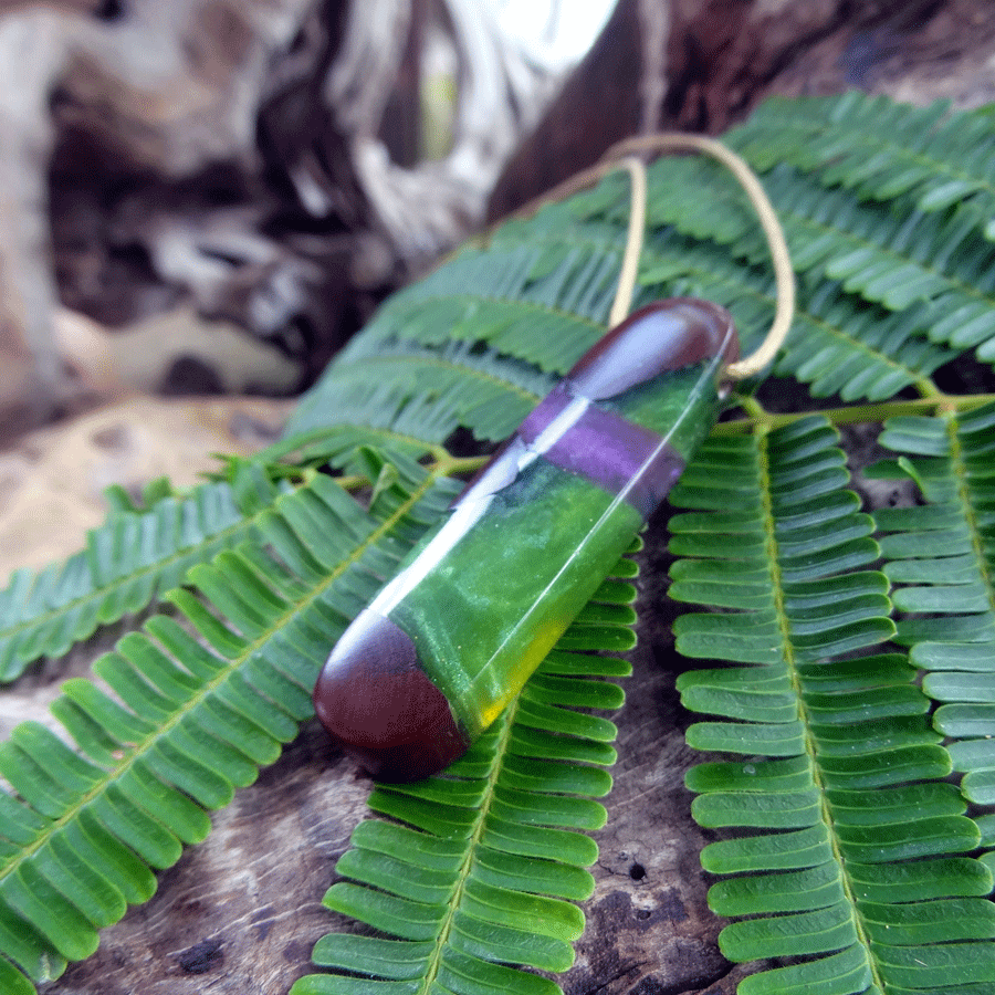 Driftwood with green and purple resin