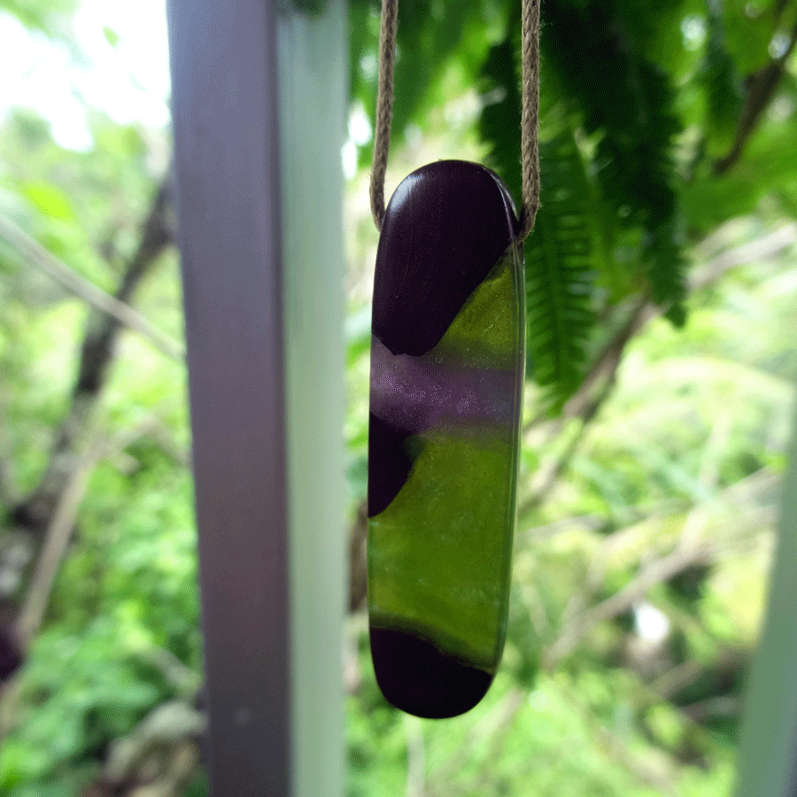 Driftwood with green and purple resin