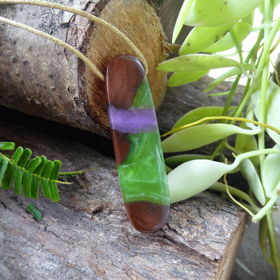 Driftwood with green and purple resin